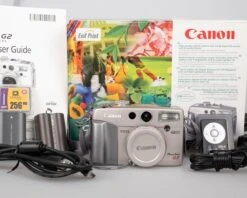 Canon® Canon Powershot G2 Digicam W/ 4 MP CCD Sensor; Includes 256MB CF Card + 2 Batteries W/ Charger + Original Box, Manuals & Accessories(Canon Powershot G2 Digicam W 4 Mp Ccd Sensor Includes 256mb Cf Card 2 Batteries W Charger Original Box Manuals Accessories)