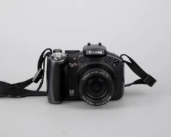 Canon® Canon Powershot S5 IS Digicam W/ 8 MP CCD Sensor + 4 GB SD Card (uses AA Batteries)(Canon Powershot S5 Is Digicam W 8 Mp Ccd Sensor 4 Gb Sd Card Uses Aa Batteries) -Vintage Camera Store Canon powershot s5IS 8mp CCD digicam 20240307 909