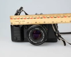 Canon® Canon T70 35mm SLR With FD 50mm F1.8 Lens (serial 1288075)(Canon T70 35mm Slr With 50mm F1 8 Lens Serial 1288075) -Vintage Camera Store Canon t70 35mm SLR serial 128075 202211142196