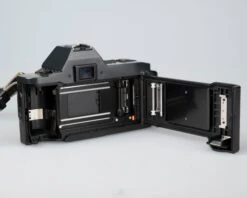 Canon® Canon T70 35mm SLR With FD 50mm F1.8 Lens (serial 1288075)(Canon T70 35mm Slr With 50mm F1 8 Lens Serial 1288075) -Vintage Camera Store Canon t70 35mm SLR serial 128075 202211142197