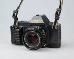 Canon® Canon T70 35mm SLR With FD 50mm F1.8 Lens (serial 1288075)(Canon T70 35mm Slr With 50mm F1 8 Lens Serial 1288075) -Vintage Camera Store Canon t70 35mm SLR serial 128075 202211142199