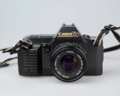 Canon® Canon T70 35mm SLR With FD 50mm F1.8 Lens (serial 1288075)(Canon T70 35mm Slr With 50mm F1 8 Lens Serial 1288075) -Vintage Camera Store Canon t70 35mm SLR serial 128075 202211142201