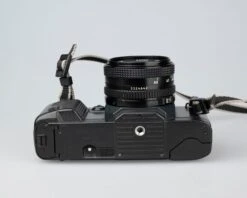 Canon® Canon T70 35mm SLR With FD 50mm F1.8 Lens (serial 1288075)(Canon T70 35mm Slr With 50mm F1 8 Lens Serial 1288075) -Vintage Camera Store Canon t70 35mm SLR serial 128075 202211142202