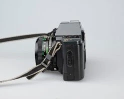 Canon® Canon T70 35mm SLR With FD 50mm F1.8 Lens (serial 1288075)(Canon T70 35mm Slr With 50mm F1 8 Lens Serial 1288075) -Vintage Camera Store Canon t70 35mm SLR serial 128075 202211142204