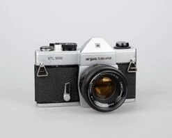 Argus Cosina STL 1000 Camera W/ Fujinon 55mm F1.8 Lens (serial 0402721)(Argus Cosina Stl 1000 Camera W Fujinon 55mm F1 8 Lens Serial 0402721) -Vintage Camera Store argus cosina STL1000 35mm film viewfinder camera serial 0402721 20240720 1812