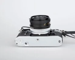 Canon® Canon AE-1 35mm SLR W/ Canon FD 50mm F1.8 Lens + Speedlite 188A Flash + Original Manual (serial 2388361)(Canon Ae 1 35mm Slr W Canon Fd 50mm F1 8 Lens Speedlite 188a Flash Original Manual Serial 2388361) -Vintage Camera Store canon AE 1 35mm film SLR camera serial 2388361 20240109 499