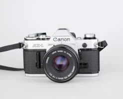 Canon® Canon AE-1 35mm SLR W/ Canon FD 50mm F1.8 Lens + Speedlite 188A Flash + Original Manual (serial 2388361)(Canon Ae 1 35mm Slr W Canon Fd 50mm F1 8 Lens Speedlite 188a Flash Original Manual Serial 2388361) -Vintage Camera Store canon AE 1 35mm film SLR camera serial 2388361 20240109 503