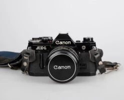 Canon® Canon AE-1 35mm SLR W/ Canon FD 50mm F1.4 S.S.C. Lens + Original Manual (serial 291207)(Canon Ae 1 35mm Slr W Canon Fd Ssc 50mm F1 4 Lens Original Manual Serial 291207) -Vintage Camera Store canon AE 1 black FD 50mm f14 35mm SLR camera serial 291207 20240711 1712