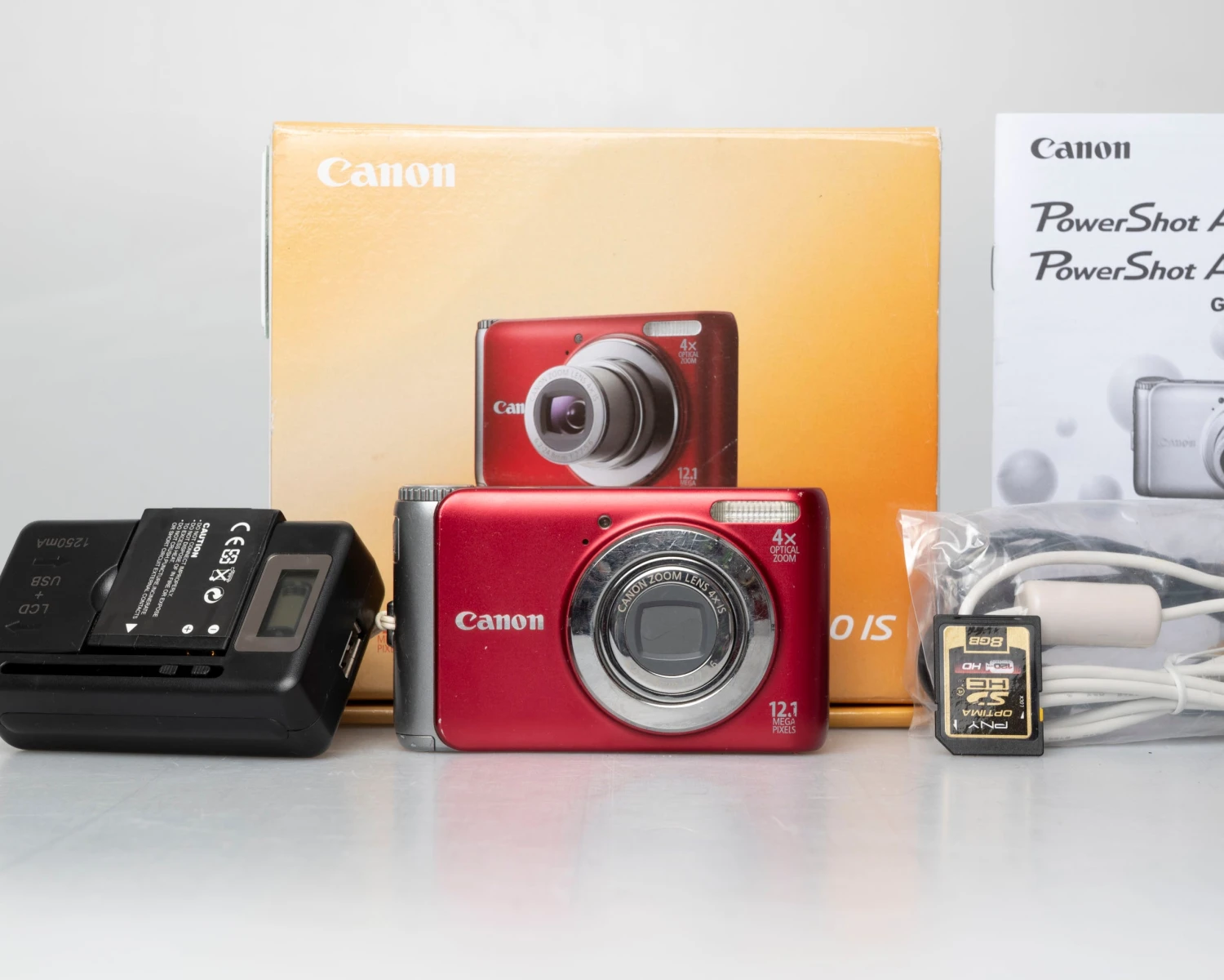 Canon® Canon Powershot A3100 IS 12.1MP CCD Sensor Digicam W/ 8GB SD Card + Battery + Charger + Original Box & Accessories (serial 042122008078)(Canon Powershot A3100 Is Digicam W 12 1mp Ccd Sensor W 8gb Sd Card Battery Charger Original Box Accessories Serial 042122008078) 1 Canon® Canon Powershot A3100 IS 12.1MP CCD Sensor Digicam W/ 8GB SD Card + Battery + Charger + Original Box & Accessories (serial 042122008078)(Canon Powershot A3100 Is Digicam W 12 1mp Ccd Sensor W 8gb Sd Card Battery Charger Original Box Accessories Serial 042122008078)
