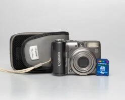 Canon® Canon Powershot A590 IS Digicam W/ 8 MP CCD Sensor; Includes 4GB SD Card + Case (serial 752403507)(Canon Powershot A590 Is Digicam W 8 Mp Ccd Sensor Includes 4gb Sd Card Caseuses Aa Batteries Copy)