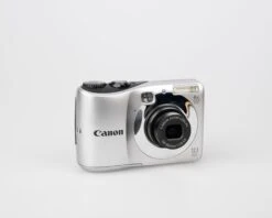 Canon® Canon Powershot A1200 Digicam W/ 12 MP CCD Sensor (uses AA Batteries And SD Memory Cards)(Canon Powershot A1200 Digicam W 12 Mp Ccd Sensor Uses Aa Batteries And Sd Memory Cards) -Vintage Camera Store canon powershot a1200 digicam 202304304089