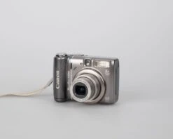 Canon® Canon Powershot A590 IS Digicam W/ 8 MP CCD Sensor; Includes 512MB SD Card (uses AA Batteries)(Canon Powershot A590 Digicam W 8 Mp Ccd Sensor Includes 512mb Sd Card Uses Aa Batteries) -Vintage Camera Store canon powershot a590IS 8MP ccd sensor digicam 20240305 744