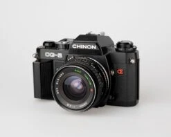 Chinon CG-5 35mm Film SLR Camera W/ Tokina 28mm Lens (serial 324283)(Chinon Cg 5 35mm Film Slr Camera W Tokina 28mm Lens Uses K Mount Lenses) -Vintage Camera Store chinon CG 5 35mm SLR camera serial 324283 202306294833