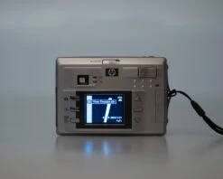 HP Photosmart 735 3.2 MP CCD Sensor Digicam W/ 512MB SD (serial Q2210A)(Hp Photosmart 735 3 2 Mp Ccd Sensor Digicam W 512mb Sd Serial Q2210a) -Vintage Camera Store hp photosmart 735 ccd digicam serial Q2210A 20250324