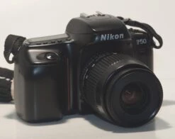 Nikon F50 35mm Film SLR(Nikon F50 35mm Film Slr Includes Af Nikkor 35 80 Lens Serial Number 2190031 Tested Works Great)