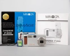Minolta DiMage F200 4 MP CCD Sensor Digicam W/ 256MB SD + Original Box + Manuals (uses AA Batteries)(Minolta Dimage F200 4 Mp Ccd Sensor Digicam W 256mb Sd Original Box Manuals Uses Aa Batteries) -Vintage Camera Store minolta dimage f200 4 megapixel CCD digicam 20240324 1200