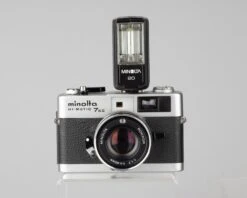 Minolta Hi-Matic 7SII 35mm Rangefinder Camera With Half-case And Minolta 20 Flash(Minolta Hi Matic 7sii 35mm Rangerfinder Camera With Half Case And Flash) -Vintage Camera Store minolta hi matic 7sii outftit with flash 202207031224