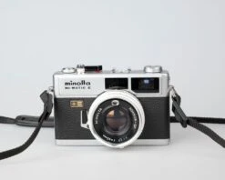 Minolta Hi-Matic E Compact 35mm Rangefinder Camera Feat. 40mm F1.7 Rokkor Lens (serial 328710)(Minolta Hi Matic E Compact 35mm Rangefinder Camera Feat 40mm F1 7 Rokkor Lens Serial 328710)