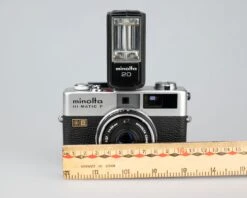 Minolta Hi-Matic F Compact 35mm Rangefinder Camera W/ Minolta 20 Flash + Ever-ready Case(Minolta Hi Matic F Compact 35mm Rangefinder Camera W Minolta 20 Flash Ever Ready Case) -Vintage Camera Store minolta himatic f 35mm rangefinder 202302273306