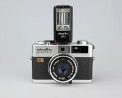 Minolta Hi-Matic F Compact 35mm Rangefinder Camera W/ Minolta 20 Flash + Ever-ready Case(Minolta Hi Matic F Compact 35mm Rangefinder Camera W Minolta 20 Flash Ever Ready Case) -Vintage Camera Store minolta himatic f 35mm rangefinder 202302273314