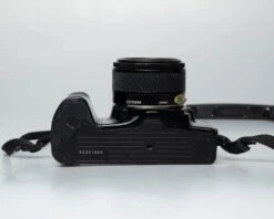 Minolta Dynax 3000i 35mm SLR W/ Minolta AF 50mm F1.7 Lens + Program D 314i Flash (serial 62301669))(Minolta Dynax 3000i 35mm Slr W Minolta Af 50mm F1 7 Lens Program D 314i Flash Serial 62301669) -Vintage Camera Store minolta maxxum 3000i film SLR camera serial 62301669 20250811 6