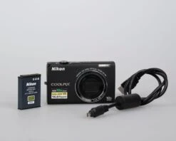 Nikon Coolpix S6100 16 MP Digicam W/ Battery + USB Charge Cable (uses SD Cards)(Nikon Coolpix S6100 16 Mp Digicam W Battery Usb Charge Cable Uses Sd Cards)
