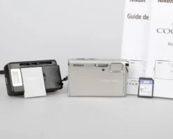 Nikon Coolpix S51C 8.1 MP Digicam W/ 4GB SD Card + Battery + Charger + Manuals(Nikon Coolpix S51c 8 1 Mp Digicam W 4gb Sd Card Battery Charger Manuals)