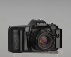 Olympus OM-88 35mm Film SLR W/ 50m F2 PF Lens And Manual Adapter 2(Olympus Om 88 35mm Film Slr W 50m F2 Pf Lens)