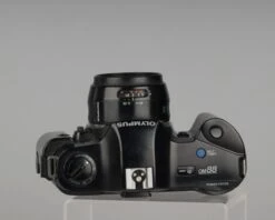 Olympus OM-88 35mm Film SLR W/ 50m F2 PF Lens And Manual Adapter 2(Olympus Om 88 35mm Film Slr W 50m F2 Pf Lens) 11 Olympus OM-88 35mm Film SLR W/ 50m F2 PF Lens And Manual Adapter 2(Olympus Om 88 35mm Film Slr W 50m F2 Pf Lens) -Vintage Camera Store olympus om88 with50mm lens 20210122 300