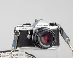 Pentax ME 35mm SLR W/ SMC Pentax M 50mm F2 Lens (serial 2040953)(Pentax Me 35mm Slr W Smc Pentax M 50mm F2 Lens Serial 2040953)