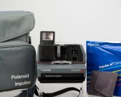 Polaroid Impulse AF Instant Camera With Original Case, Prism Lens Filter, And Manual (serial C4K18579YDCA)(Polaroid Impulse Af Instant Camera With Original Case Prism Lens Filter And Manual Serial C4k18579ydca)