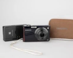Samsung PL150 12.4 MP CCD Sensor Digicam W/ 8GB Micro SD + Case+ Charger(Samsung Pl150 12 4 Mp Ccd Sensor Digicam W 8gb Micro Sd Card Charger)